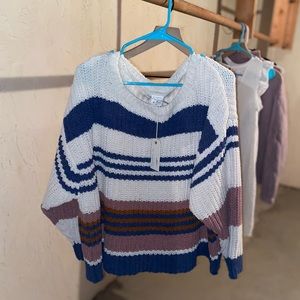 Boutique sweater, never worn- new with tags